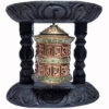 rueda oración cobre madera